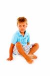 Boy Sitting Stock Photo