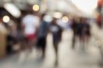 Blurred People Walking On The Street Stock Photo