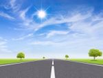 Asphalt Road Leading To Horizon Stock Photo