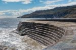 The Cobb Harbour Wall In Lyme Regis Stock Photo