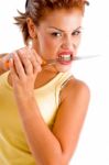 Lady Biting Butcher Knife Stock Photo