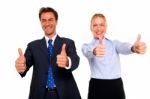 Business People With Thumbs Up Stock Photo