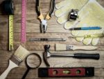 Set Of Tools Over A Wood Background Stock Photo