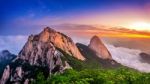 Bukhansan Mountains Is Covered By Morning Fog And Sunrise In Bukhansan National Park, Seoul In South Korea Stock Photo