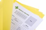 Blank Medical Record In Yellow Folder Stock Photo