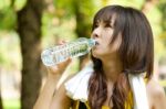 Asian Girl Drinking Water Stock Photo