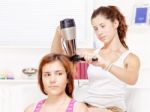 Teenage Girl Dries Hair To Her Friends Stock Photo