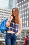 Portrait Of Thai Chinese Adult Beautiful Girl Denim Blue Bag Travel Relax And Smile Stock Photo