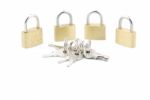 Golden Closed Padlocks With Keys On White Stock Photo