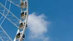 White Ferris Wheel Cloud And Blue Sky Stock Photo