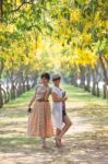 Portrait Of Couples Beautiful Asian Woman Standing In Blooming F Stock Photo