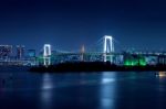 Tokyo Skyline With Rainbow Bridge And Tokyo Tower. Tokyo, Japan Stock Photo