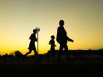 Silhouette Teen Age Run Together  Track Stock Photo