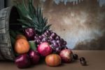 Assorted Fresh Fruits On A Wooden Stock Photo