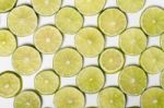 Round Slices Of Lime Fruit Stock Photo