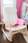 Modern White Rocking Chair Stock Photo