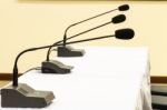 Microphones In Conference Room Stock Photo