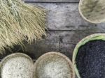 White And Black Organic Brown Rice In  Round Rattan Woven Basket Stock Photo