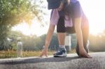 Young Athletes At Starting Position Ready To Start A Race. Sprin Stock Photo