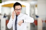 Businessman Look His Watch Stock Photo