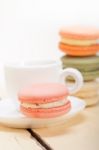 Colorful Macaroons With Espresso Coffee Stock Photo