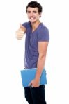 Young Boy Showing Thumbs Up Stock Photo