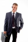 Businessman Standing With Briefcase Stock Photo