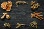 Dried Herbs And Ginseng, Top View Of Thai Herbs And Ginseng On Wooden Floor Stock Photo