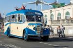 Old Bus Approaching The Finish Line Of The London To Brighton Ve Stock Photo