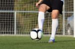 Shoot Of Football Player On The Outdoors Field Stock Photo