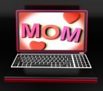 Mom On Laptop Showing Digital Card Stock Photo