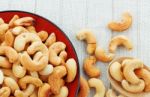 Cashew Salt Roasted On Tablecloth Stock Photo