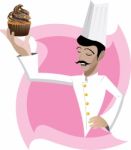 Chef Holding A Cupcake Stock Photo