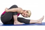 Middle Age Woman Doing  Yoga Exercise Stock Photo