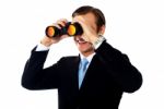 Man Looking Through Binoculars Stock Photo