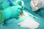 Doctor Using An Electronic Scalpel In A Surgery Stock Photo