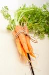 Baby Carrots Bunch Tied With Rope Stock Photo