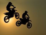 Motorcycle Jumps In The Air Stock Photo