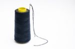 Spool Of Thread With Needle Stock Photo