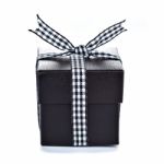 Black Gift Box With Checkered Ribbon Stock Photo