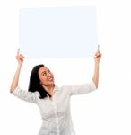 Woman Holding Up A Blank White Billboard Stock Photo