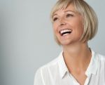 Woman Laughing Heartily Stock Photo