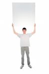 Teenage Boy Holding Blank Board Stock Photo