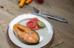 Salmon Steak On Wooden Table Stock Photo