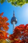 Seoul Tower And Red Autumn Maple Leaves At Namsan Mountain In South Korea Stock Photo