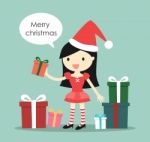 Santa Girl With A Lot Of Gift Boxes And Saying 'merry Christmas' Stock Photo