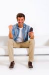 Man Is Sitting Stock Photo