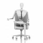 Businessman Doll Sitting On Chair Stock Photo