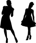 Silhouettes Of Fashion Girls Stock Photo