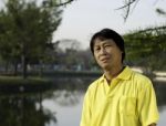 Portrait Of A Happy Man Thailand Park Stock Photo